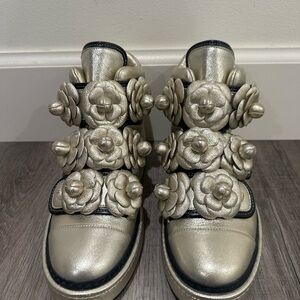 CHANEL LEATHER HIGHTOP SNEAKERS.